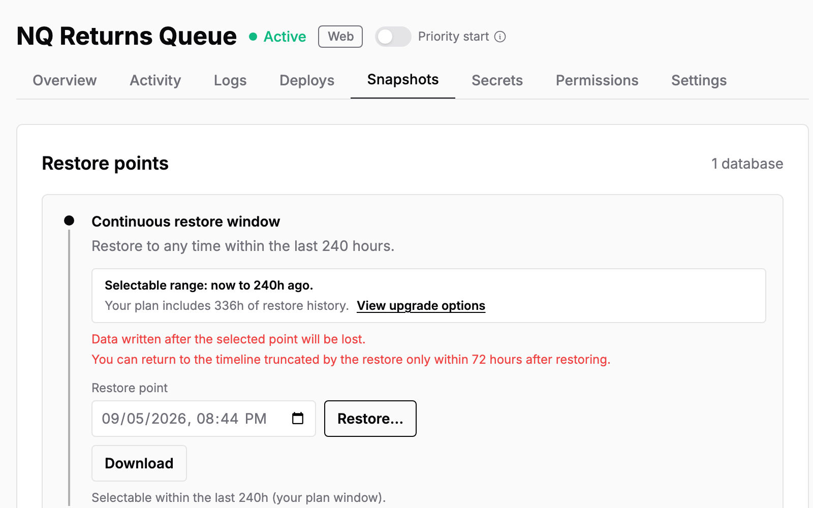 The available recovery window, a point-in-time field, and restore and download actions.